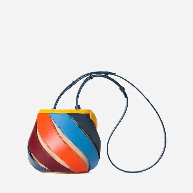 Stylish striped PU leather bucket handbag with versatile carry options and roomy interior