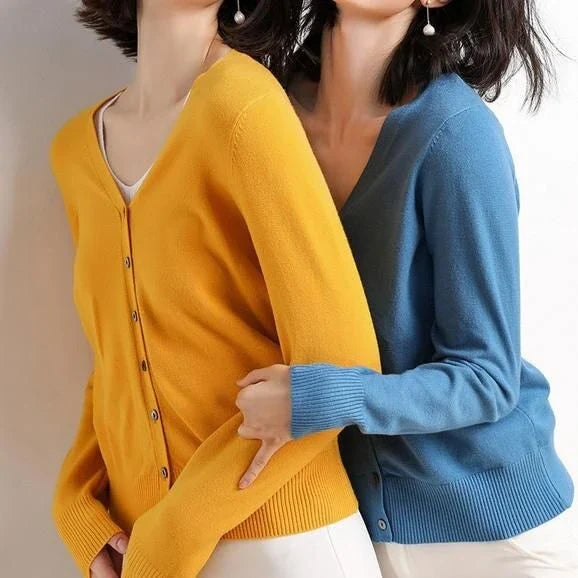 Chic v-neck single breasted cardigan in blue, green, and pink colours with a sophisticated and timeless design