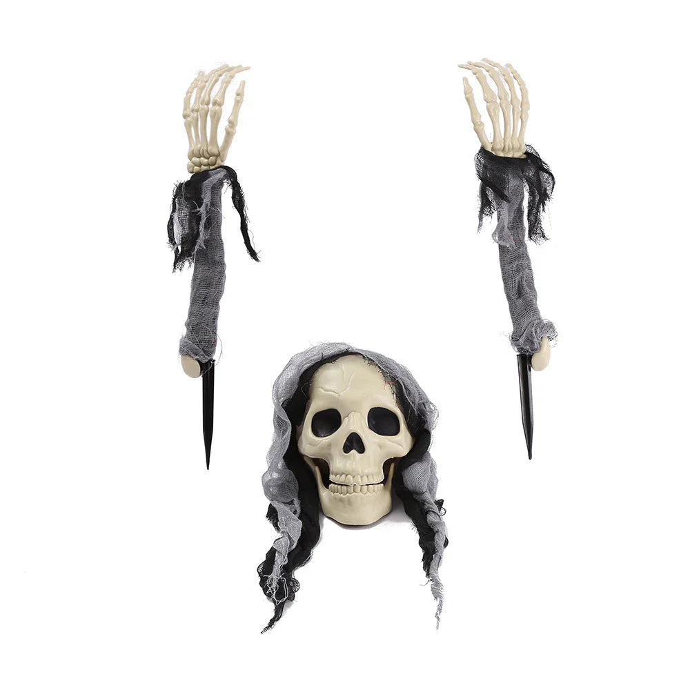 Three decorative plastic skull figures in green, red, and grey colours, perfect for Halloween home decor