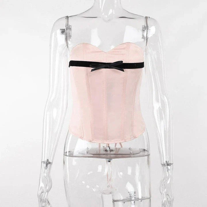 Stylish bow-accented waist back fashion in pink, made with premium polyester for a comfortable and flattering fit.