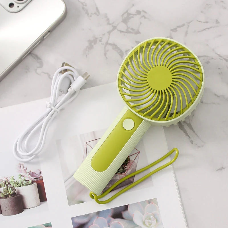 Mini Handheld USB Rechargeable Fan with 3 wind speed settings, rechargeable battery, and integrated night light