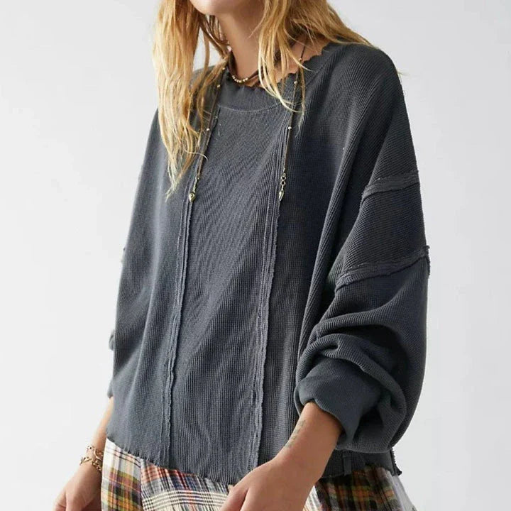 Chic cotton sweatshirt for women featuring a unique patchwork design, classic O-neck collar, and full-length sleeves for cosy comfort and fashion-forward style.