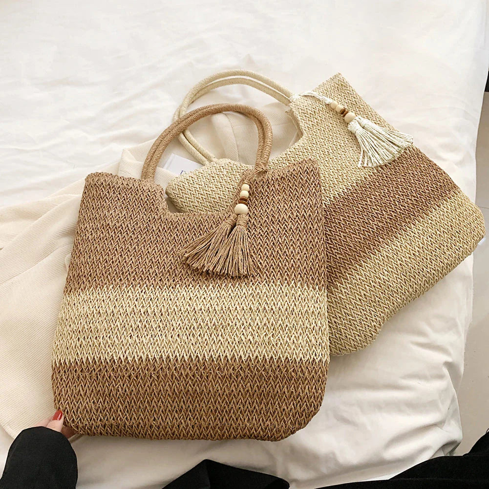 Stylish bohemian-inspired woven tote bag with contrasting tassels, perfect for summer outings