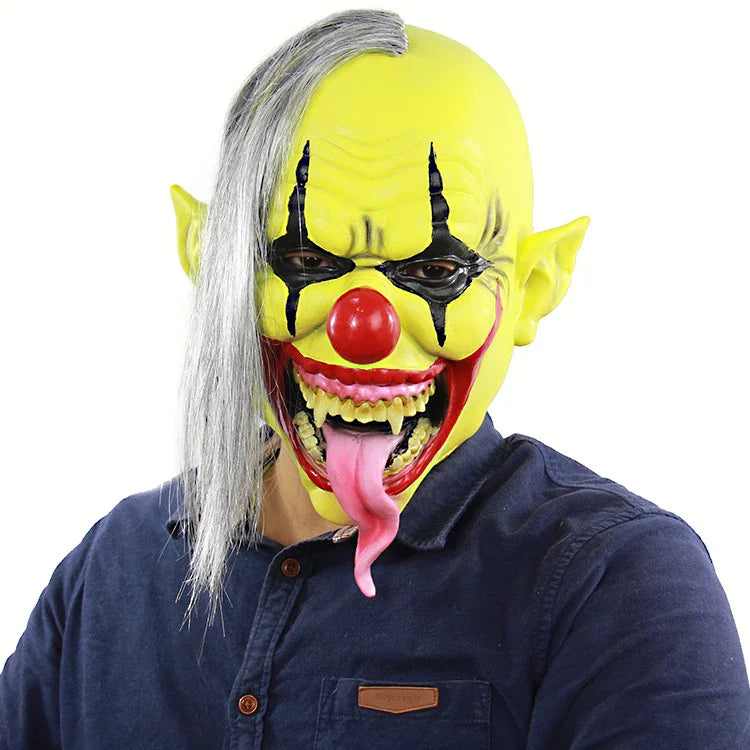 A chilling green-faced clown latex mask with a lifelike and unsettling expression, perfect for Halloween and Christmas festivities.