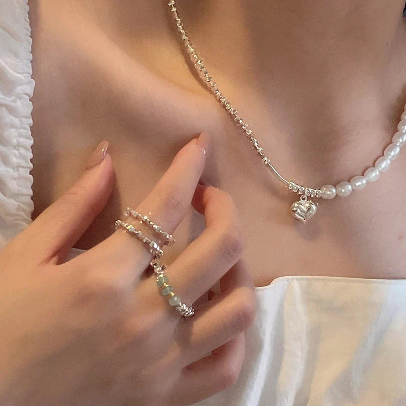 Elegant heart-shaped pearl necklace in sterling silver, a timeless British-inspired accessory