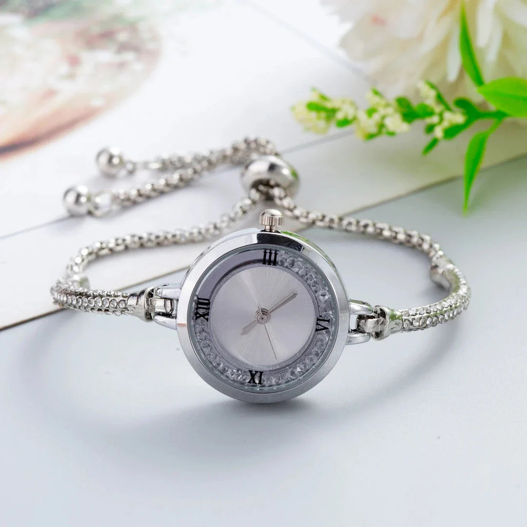 Elegant stainless steel quartz women's watch with compact dial, designed for timeless style and functionality