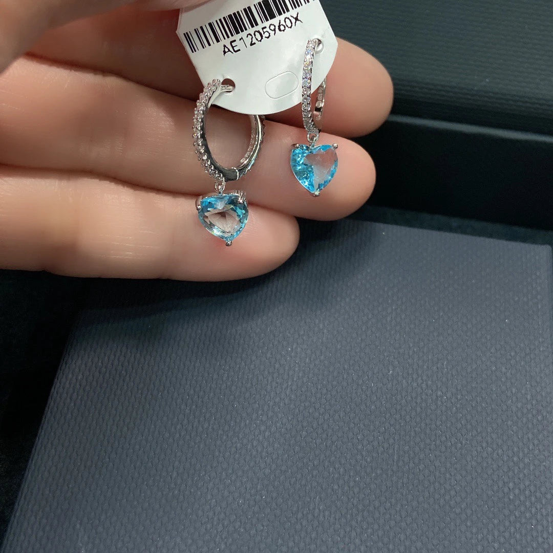 Radiant 925 sterling silver earrings with blue, green, yellow, or white gemstones for stylish women