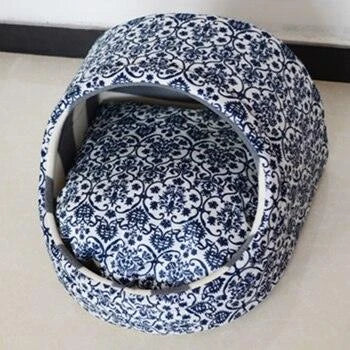 Luxurious machine-washable dog kennel in various colours, featuring premium nylon construction and plush interior for ultimate canine comfort.