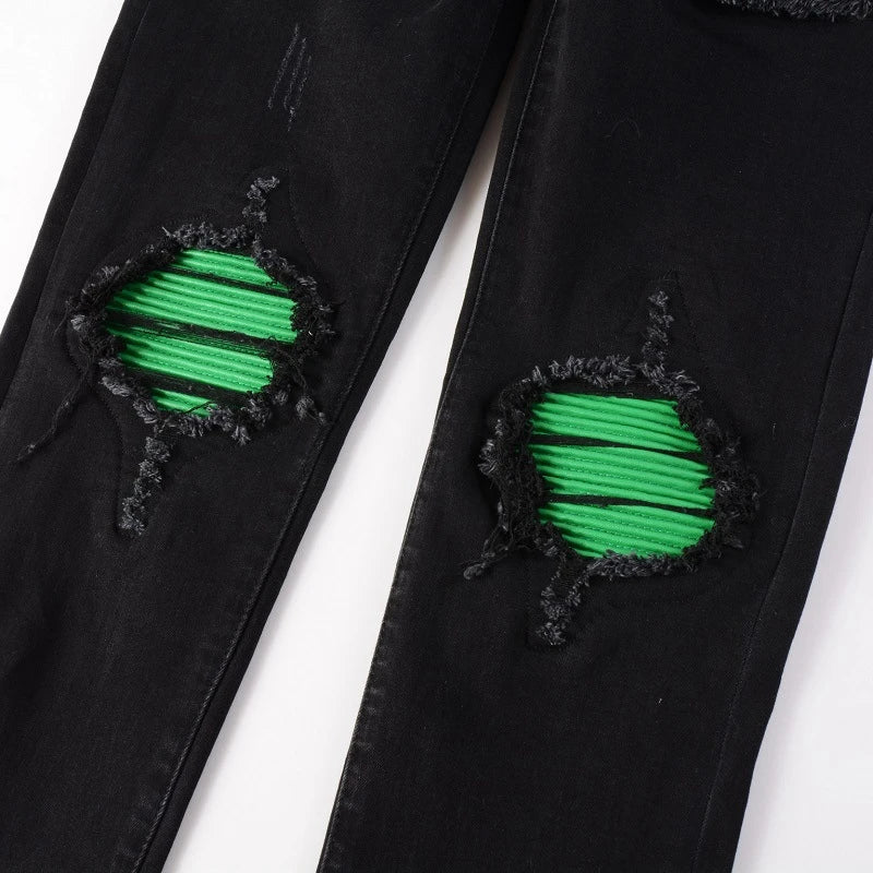 Premium ripped black jeans with stylish green patchwork design, made with medium-elastic fabric for comfort and a slim, flattering silhouette.