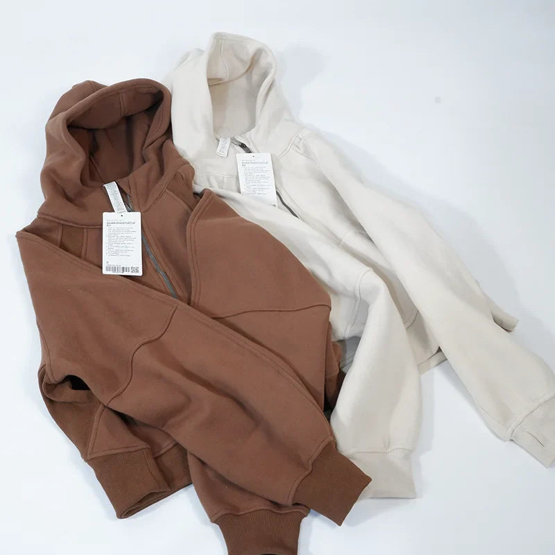 Premium women's sports fleece hoodie with half zip, available in a range of sophisticated colours