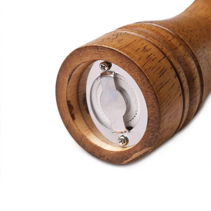 Premium eco-friendly wooden spice grinder with stainless steel accents, designed for consistent spice grinding and sustainable kitchen use.
