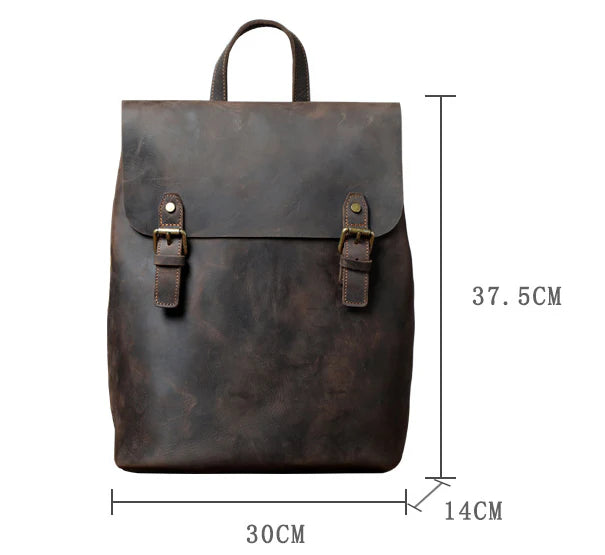 Premium vintage leather backpack with a classic design, featuring a spacious main compartment and adjustable padded shoulder straps for comfortable wear.