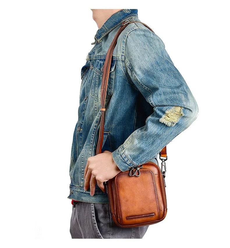 Premium retro leather messenger bag with spacious main compartment, side pockets, and robust handle for comfortable carrying