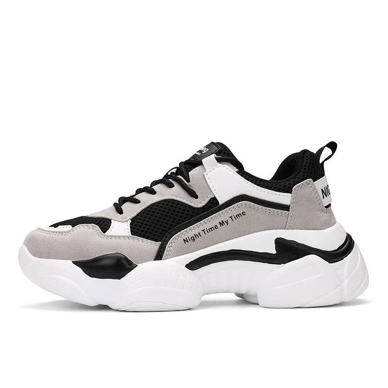 Stylish white platform casual shoes for women, featuring a round toe, thick heel, and comfortable, supportive design.