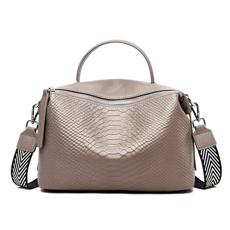 Premium first-layer cowhide leather messenger bag with adjustable strap and multiple compartments for organised storage