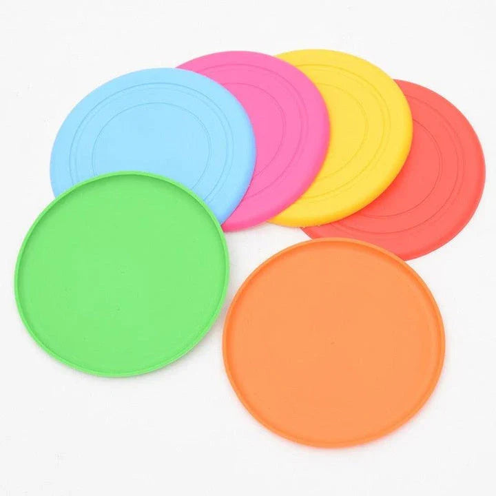 Colourful silicone frisbee dog toy with flexible, durable construction for energetic playtime