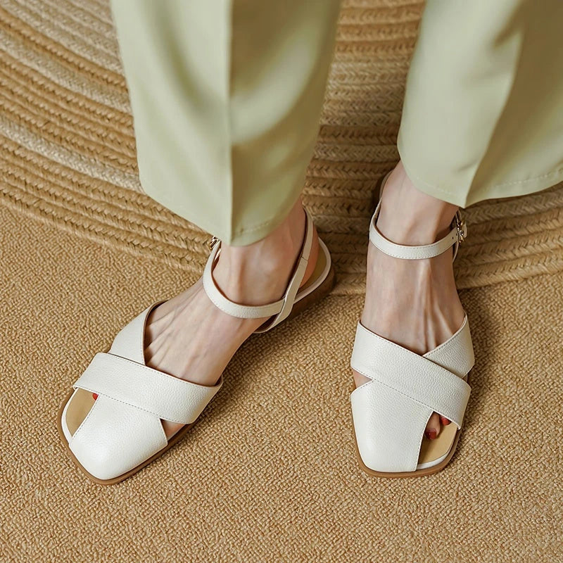 Stylish and comfortable low-heel leather sandals in green, perfect for summer wear