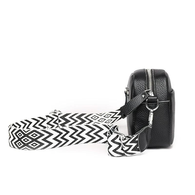 Stylish leather crossbody bag with embroidered strap in various colours