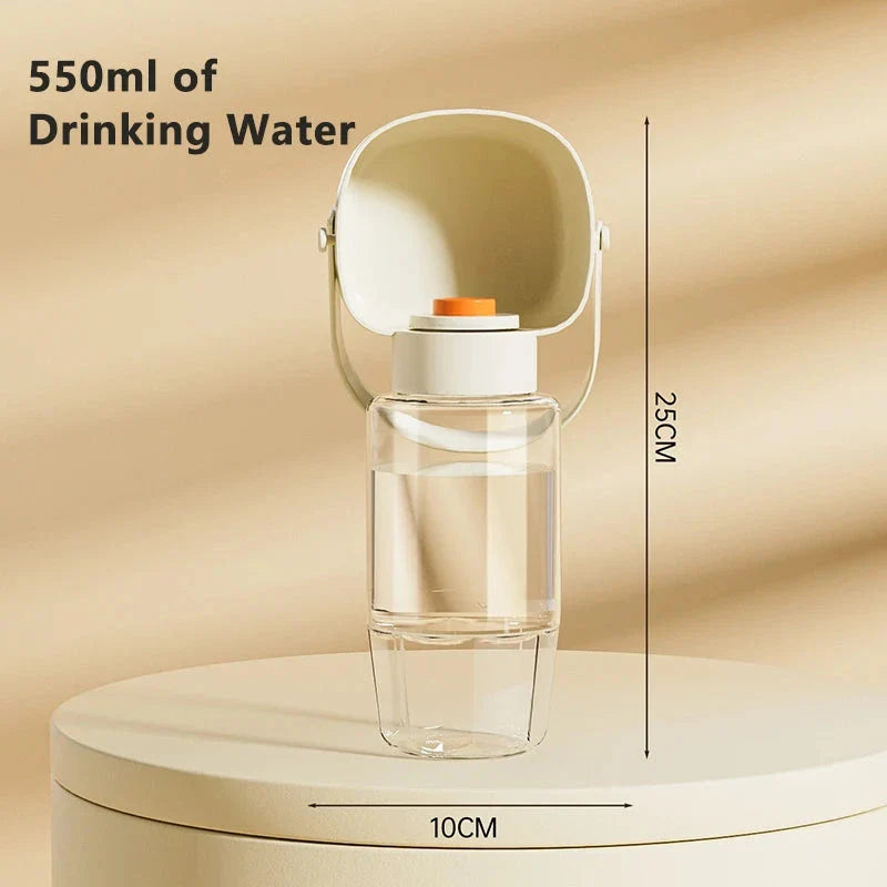 Portable pet water bottle and feeder with separate compartments for water and food, designed for easy hydration and feeding during outdoor adventures.