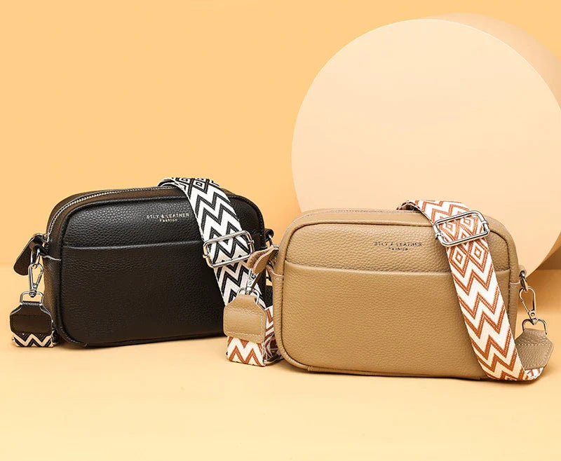 Stylish leather crossbody bag with embroidered strap in various colours
