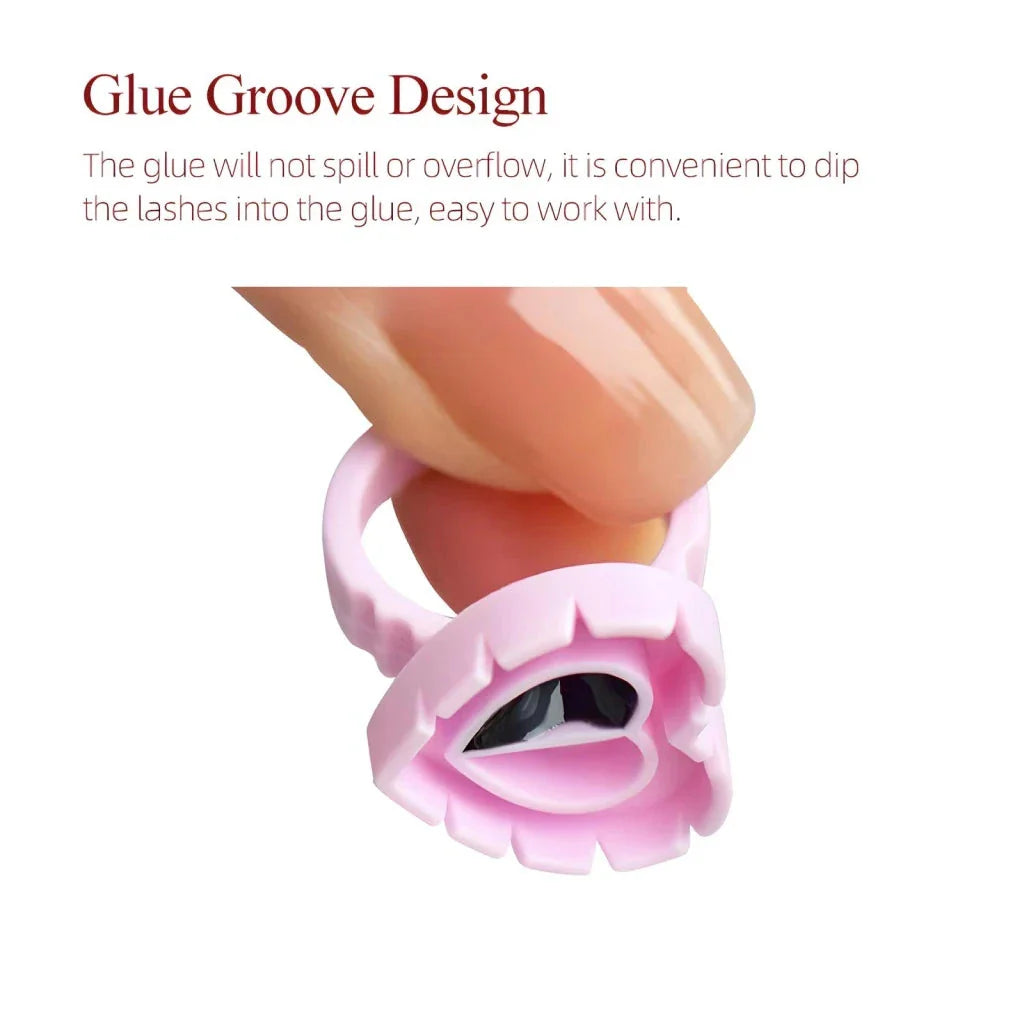 Heart-shaped disposable eyelash glue rings in blue, pink, and white colours