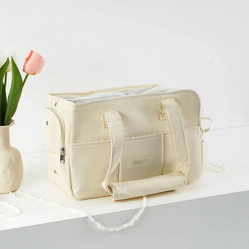 Portable One-Shoulder Pet Carrier Bag made of soft, breathable cotton for comfortable pet travel in the UK