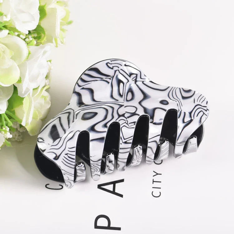 Elegant large floral acrylic hair clips in various colours for a sophisticated look