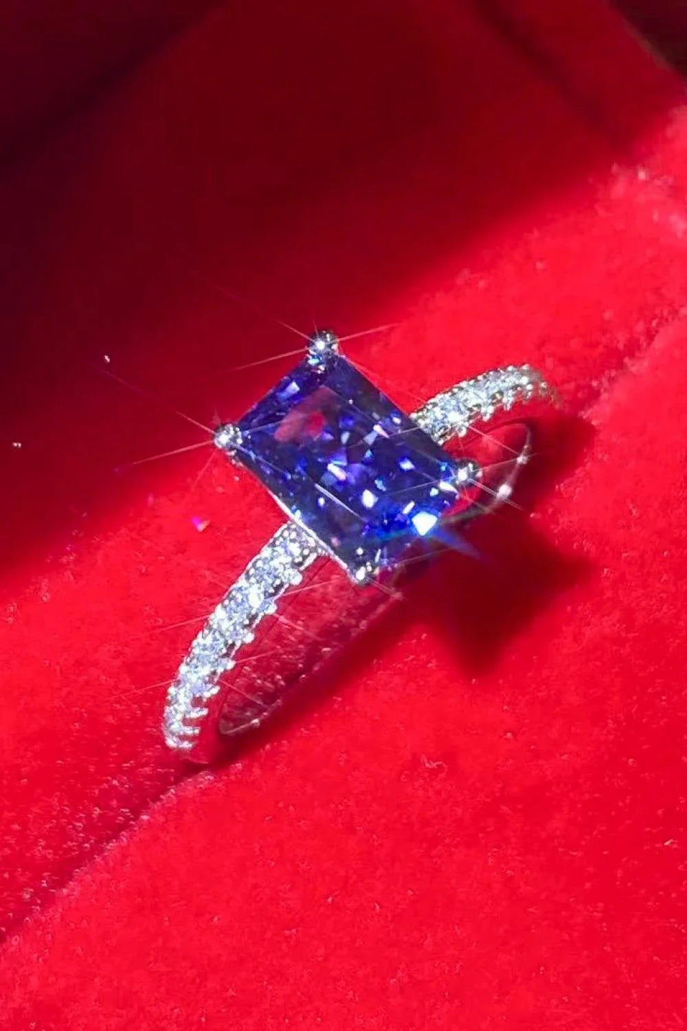Elegant 1 Carat Moissanite Sterling Silver Ring in a beautiful blue hue, showcasing a minimalist design and premium construction.
