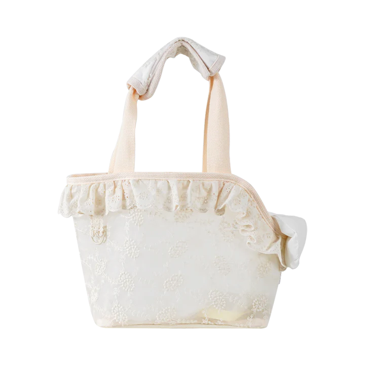 Stylish and comfortable pet carrier bag for small dogs in a floral lace design, providing breathable and cushioned support for your furry friend