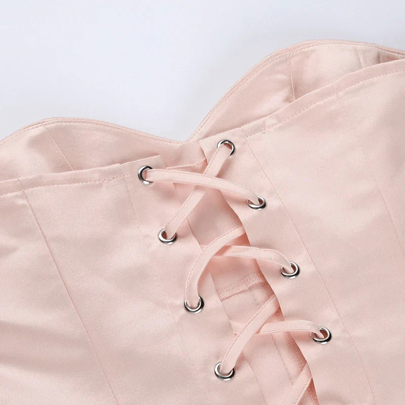 Stylish bow-accented waist back fashion in pink, made with premium polyester for a comfortable and flattering fit.