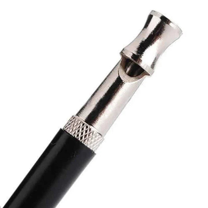Compact ultrasonic dog training whistle in black and silver color, with a keyring loop for easy attachment