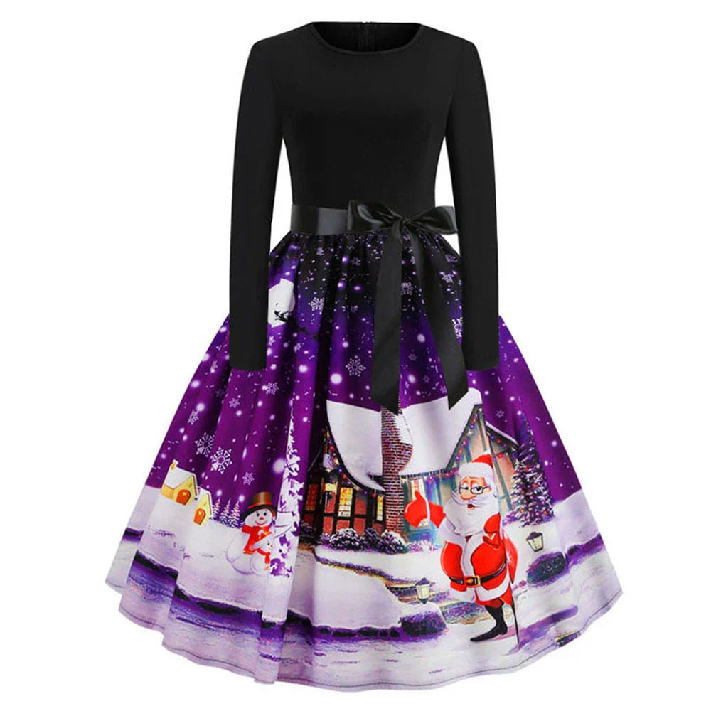 A festive, vintage-inspired Christmas dress with a vibrant retro print, flowing swing skirt, and long sleeves for a timeless, feminine look.