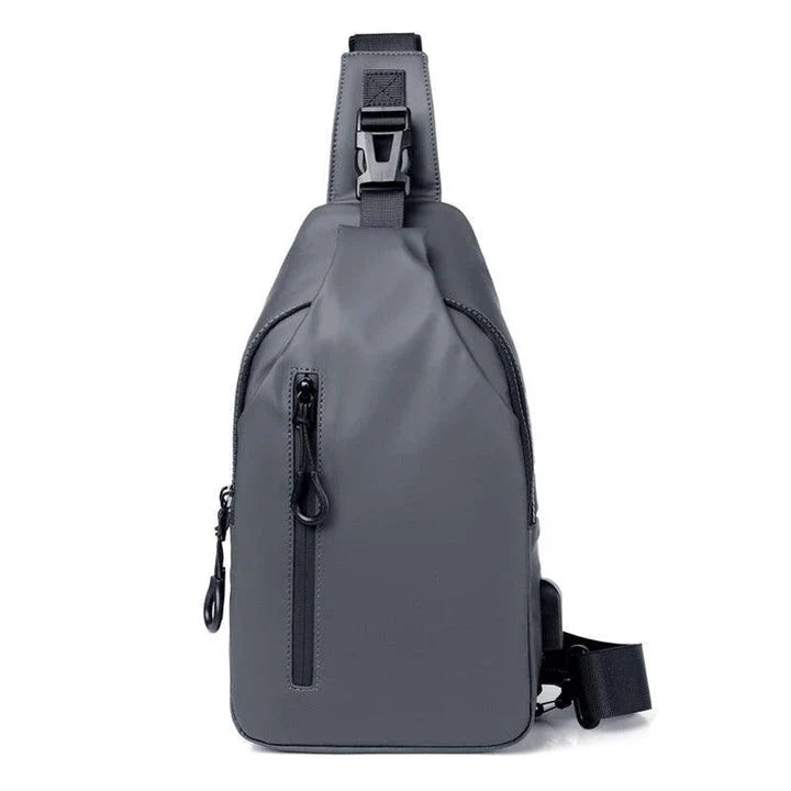 Versatile blue sling crossbody backpack for men with adjustable strap and spacious interior