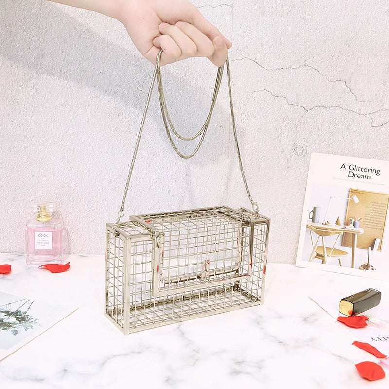 A sophisticated British-designed metal mesh clutch bag with a chain strap, available in various colours and chain styles