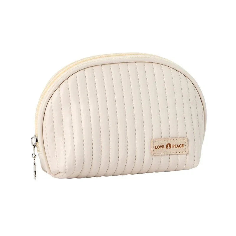 Compact Shell Cosmetic Bag for Women - A stylish and functional makeup pouch for the modern British woman
