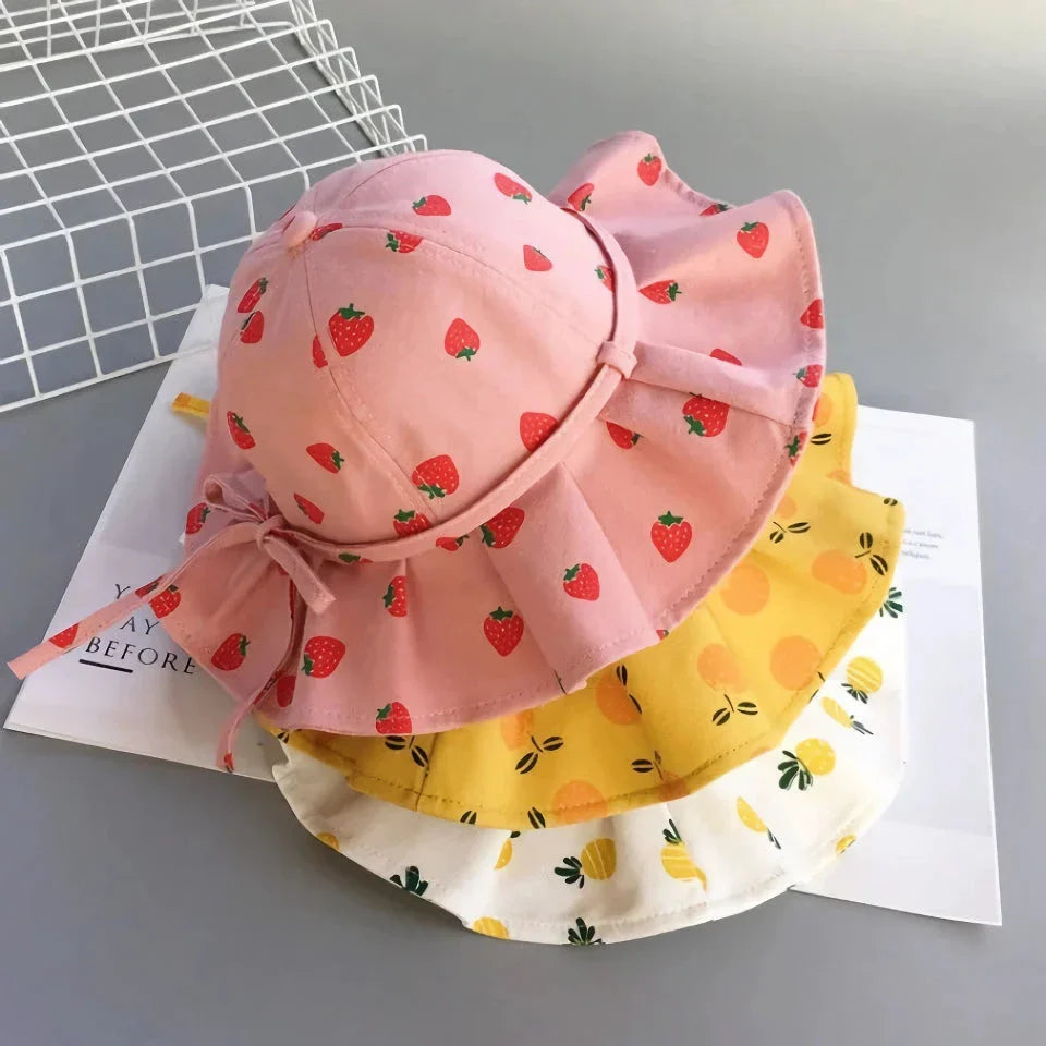 Adjustable white cotton sun protection bucket hat with cartoon pattern for children