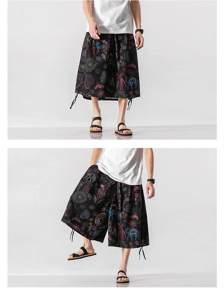 Men's loose-fitting Chinese-inspired cropped pants with a dragon or elephant floral pattern in navy blue, red, or coffee colours