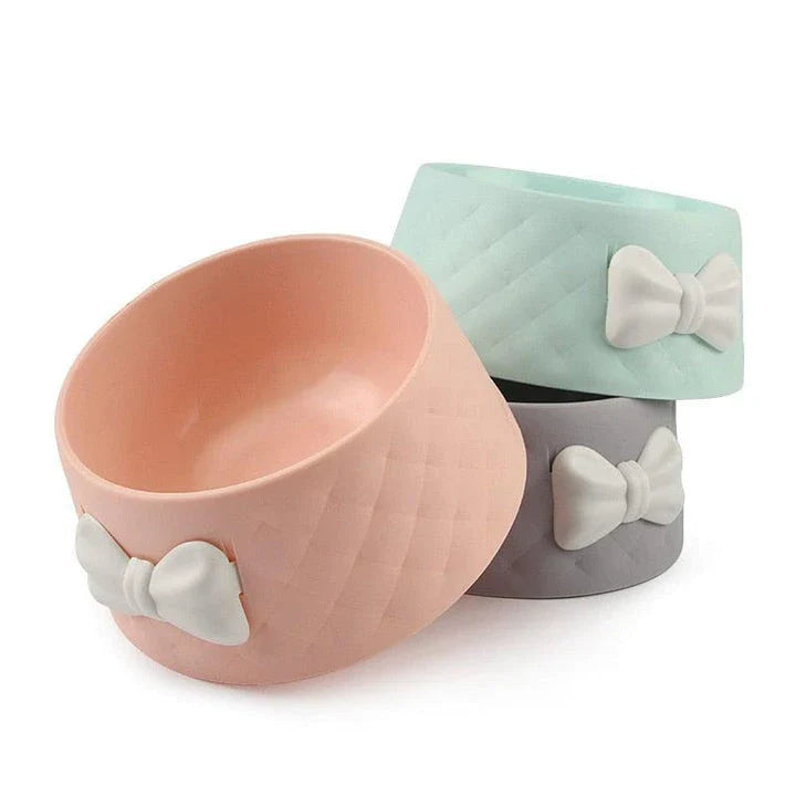 Stylish bowknot feeding bowl for pets, available in blue, grey, and pink colours