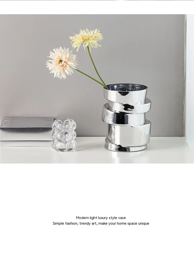 Electroplated silver glass vase with a modern, geometric design for home decor