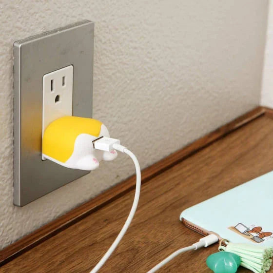 Cheeky Corgi USB Charger: A whimsical, British-inspired device that celebrates your love for corgis while keeping your tech powered up on the go.