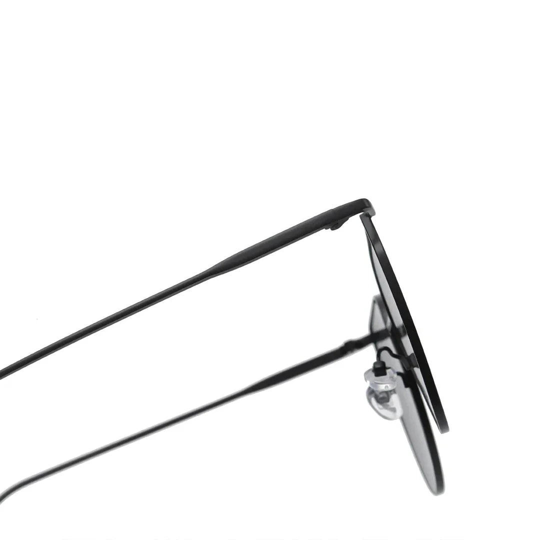Elegant oval-shaped sunglasses with gradient lenses and alloy frames, offering timeless British style and UV protection.