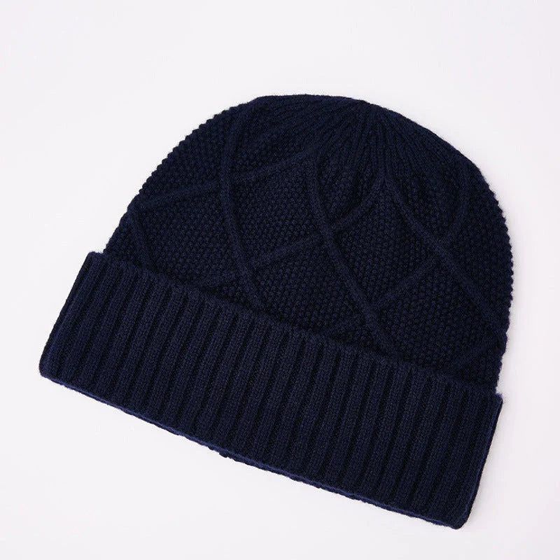 Premium knitted hat in various colours with a dome-shaped design, concave stripe pattern, and adjustable fit for warm outdoor fashion