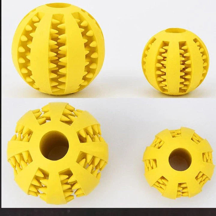 Premium natural rubber interactive ball for dogs in various colours, designed to provide mental stimulation and physical exercise.