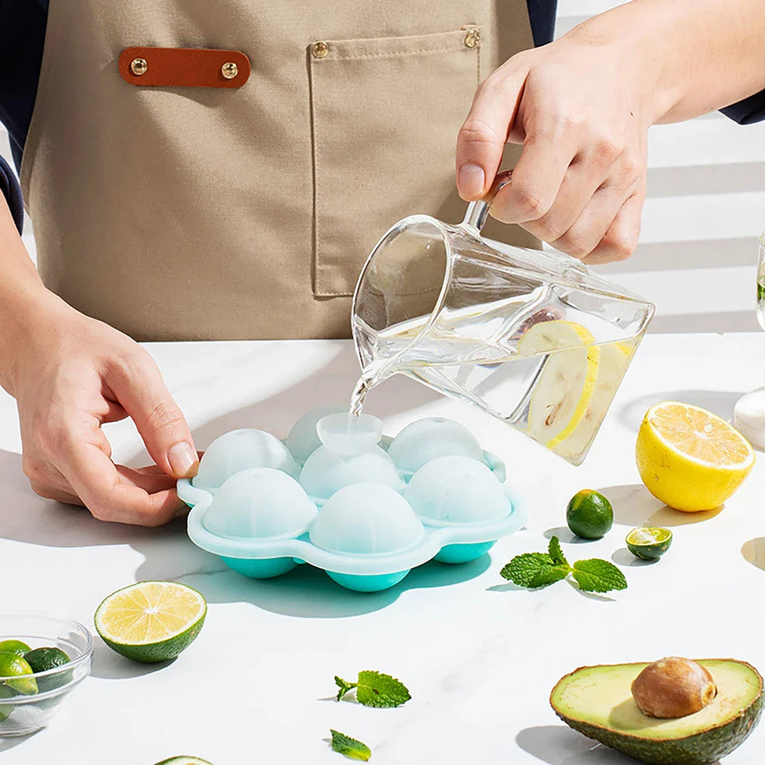 Spherical silicone ice mould with seven holes for creating perfectly round ice spheres to chill drinks