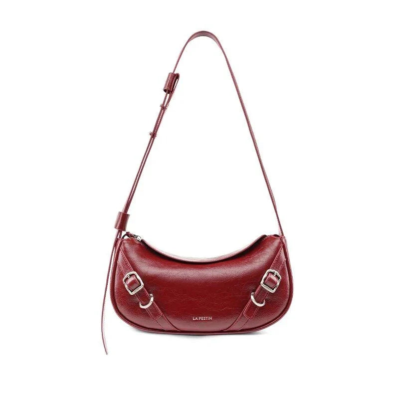 Elegant black shoulder and crossbody baguette bag made with premium split leather and synthetic lining