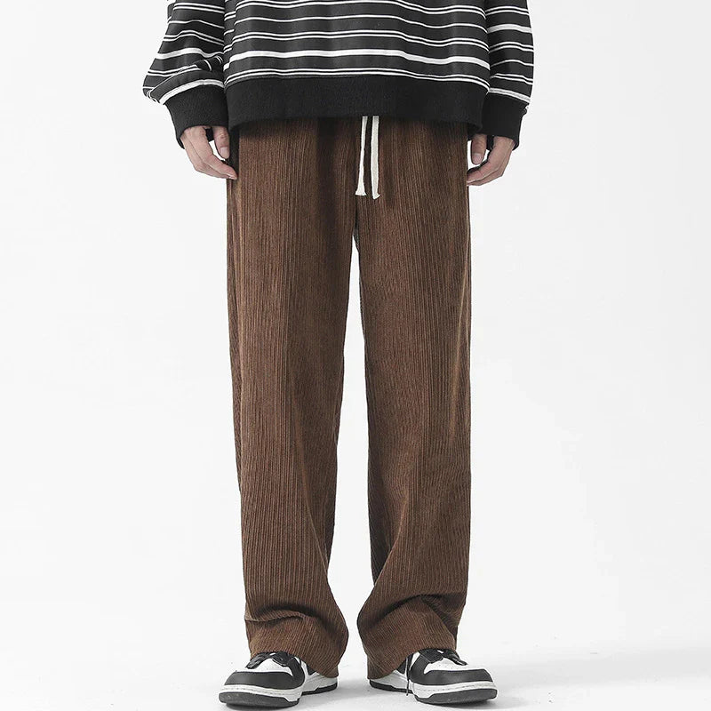 Premium fleece-lined corduroy trousers in a range of versatile colours, featuring a relaxed, straight-leg silhouette for a sophisticated, comfortable look.