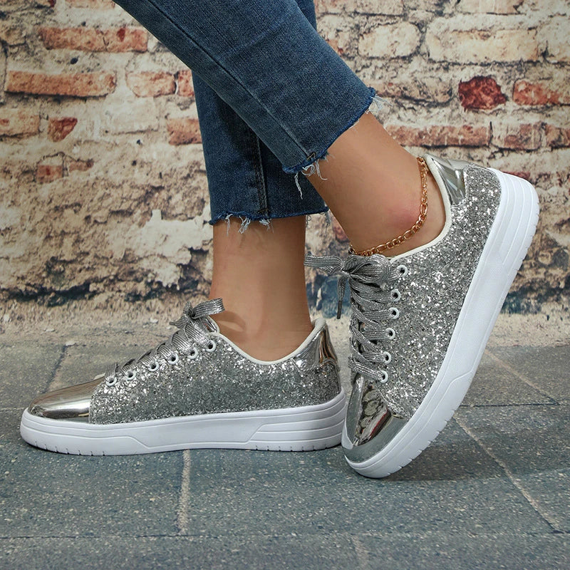 Glittering sequin flats with thick soles and lace-up closure in various vibrant colours