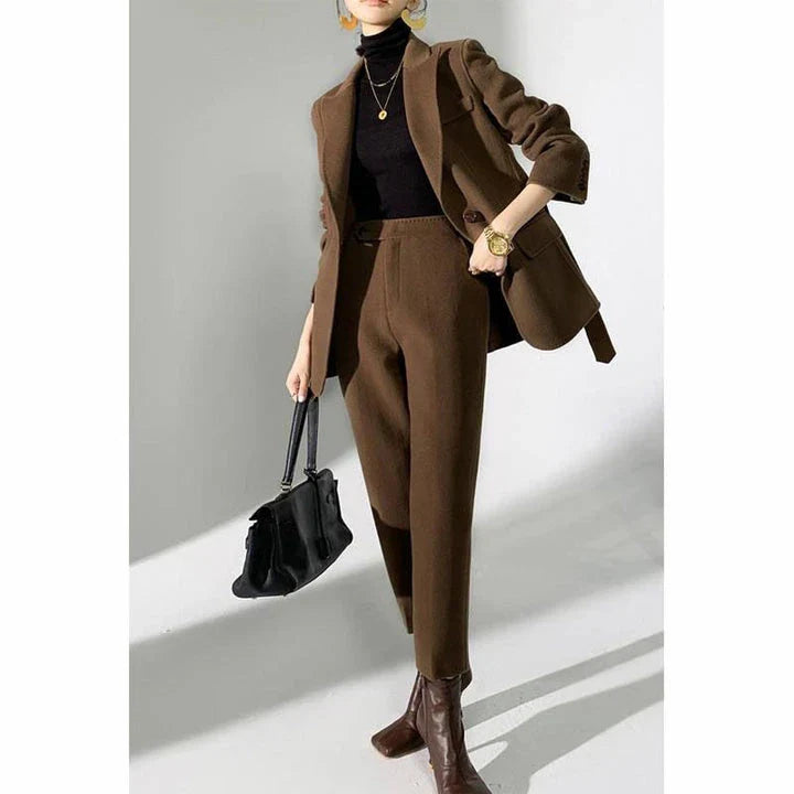 Elegant autumn-winter woollen pant suit with belted jacket and warm trousers for women