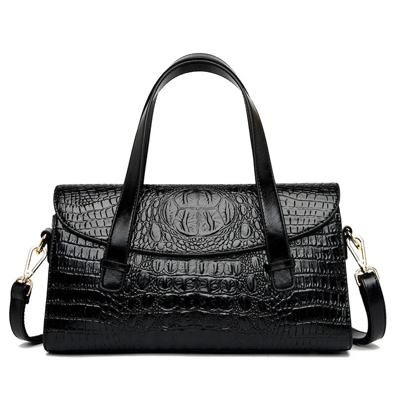 Premium crocodile pattern leather shoulder bag in multiple colours, featuring a pillow-shaped design for comfortable carrying and multiple interior pockets for organisation.