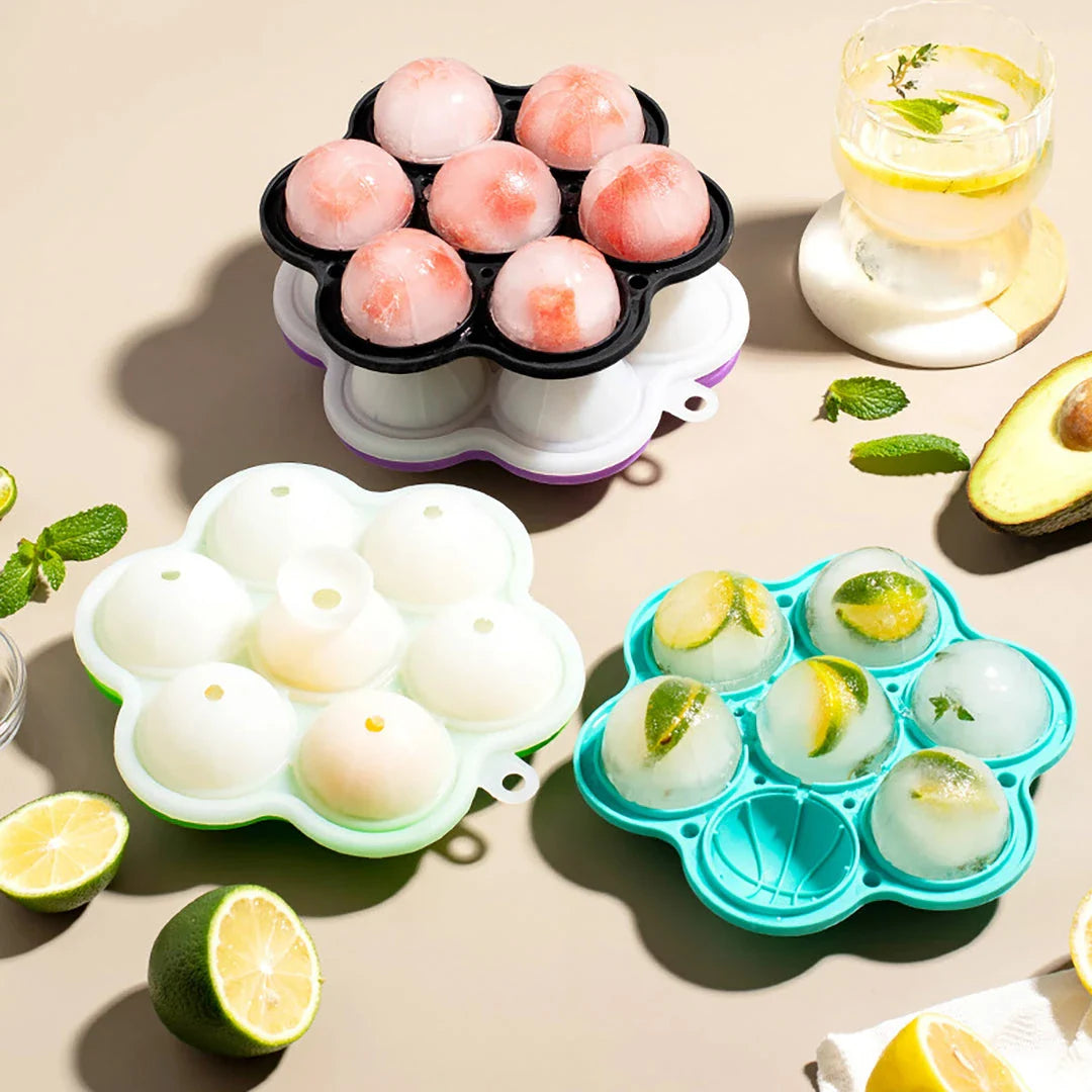 Spherical silicone ice mould with seven holes for creating perfectly round ice spheres to chill drinks